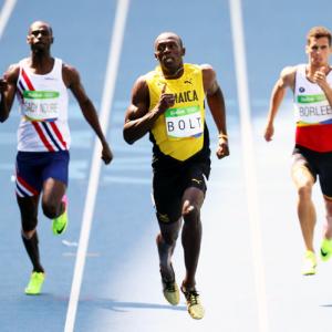 Usain Bolt eases into 200m semis in 20.28s