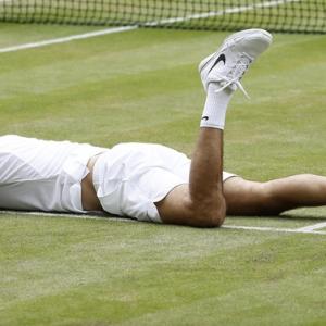 Wimbledon: Federer stunned; Raonic, Murray to clash in final