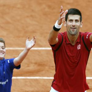 Djokovic, Serena face overtime in Paris