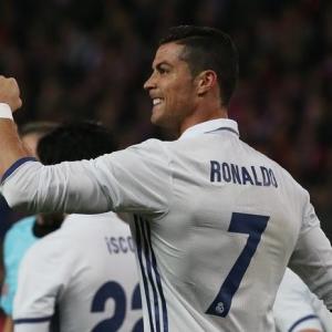 La Liga: Ronaldo treble sinks Atletico, Barcelona held