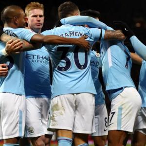 EPL PHOTOS: City down United in derby; Arsenal and Liverpool held