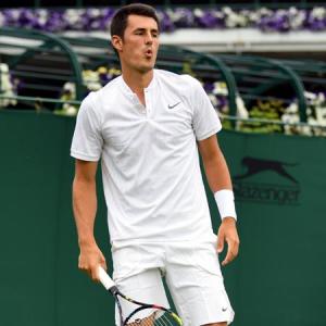 'I was bored,' Tomic says after first-round defeat at Wimbledon