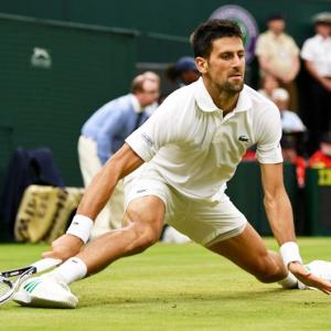 Djokovic complains about delay and 'hole' on Centre Court