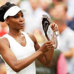 Error-prone Venus heaps praise on Muguruza after Wimbledon heartbreak