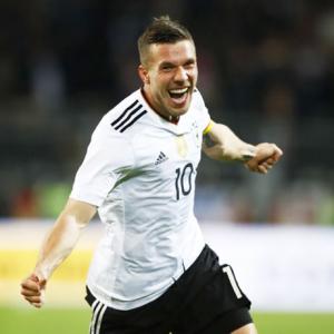 Friendly: Podolski bids goodbye with stunning winner over England