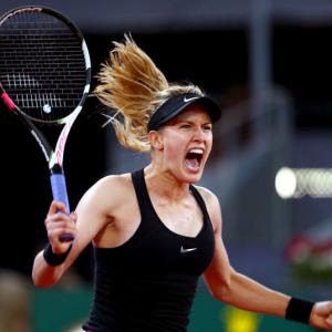 'Motivated' Bouchard claims victory over Sharapova in thriller