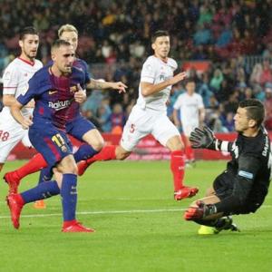 Alcacer steals limelight from Messi as Barca sink Sevilla