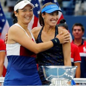 Hingis wins second Slam in two days!