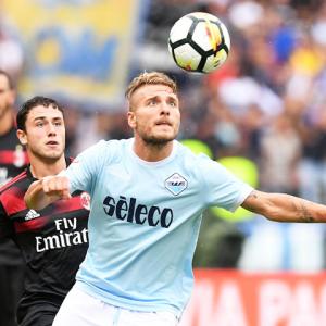 Football Briefs: Immobile hat-trick destroys Milan's perfect record