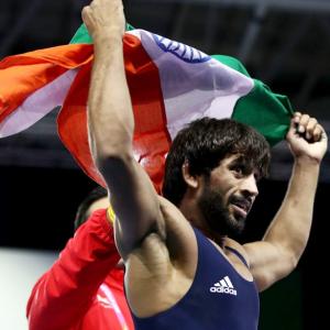 Bajrang leads Indian wrestlers' charge; silver for Khatri, Dhanda