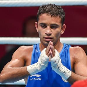 Panghal punches out Olympic champ to claim Asian Games gold