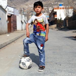 Afghan 'Messi boy' forced to flee home