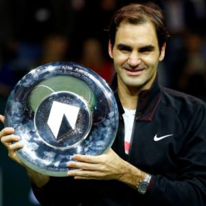 Federer cruises past Dimitrov to claim Rotterdam title