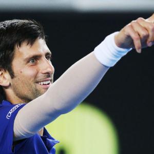 Djokovic makes service change as elbow still not '100 percent healed'
