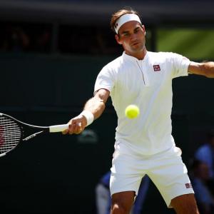 New-look Federer straight back in the old routine