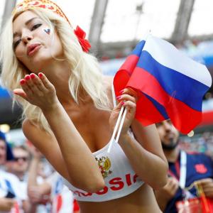 Pain, luck, fans -- and God -- see Russia home over Spain