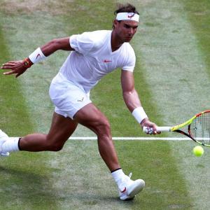 Old-style Wimbledon lawns would have snagged Nadal, says Laver