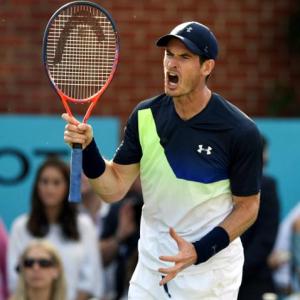 Tennis: Murray's comeback ends in defeat; Federer cruises