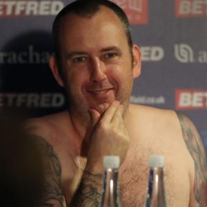 WATCH! This champ strips naked for his winning press conference