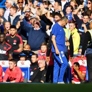 Chelsea coach charged with improper conduct after melee
