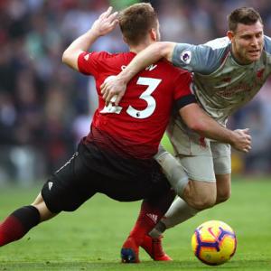 EPL PIX: Liverpool go top with draw at United; Arsenal cruise