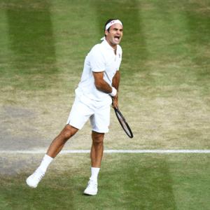 Federer downs Nadal to enter his 12th Wimbledon final