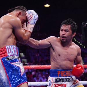 Sports Shorts: Pacquiao beats Thurman to win WBA crown