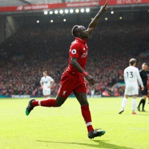 EPL PIX: Firmino, Mane keep Liverpool in the race; Arsenal beat United