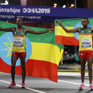 PIX: Desisa wins midnight marathon; Hassan double