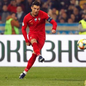 PIX: Ronaldo nets 700th career goal; France held