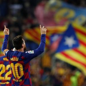 La Liga: Messi sends Barcelona top; Atletico held