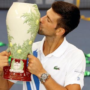 PIX: Unstoppable Djokovic downs Raonic to win title