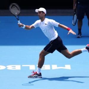 Djokovic crosses fingers for clean air in Melbourne