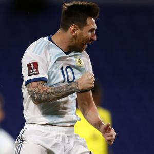 PIX: Messi gives Argentina winning start; Belgium held