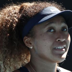 Calmer Osaka looking to be role model on court