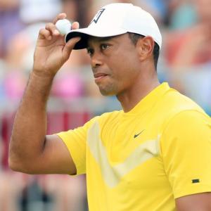Recovering Tiger Woods in 'good spirits'