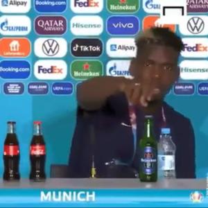 Pogba removes Heineken bottle at Euro news conference