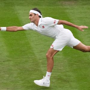 Wimbledon PIX: Serena retires; Federer survives