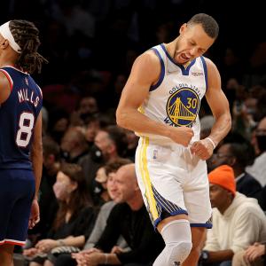 NBA: Curry hits nine 3s in Warriors' rout of Nets