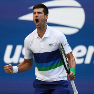 US Open Pix: Djokovic cruises; Rogers stuns Barty