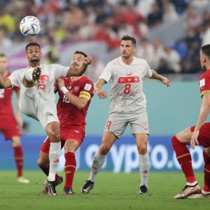 Switzerland move on to last 16 at Serbia's expense