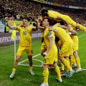 Euro qualifiers: Romania clinch top spot; France held