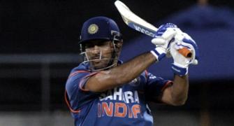 Dhoni century lifts India to victory