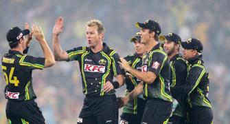 PHOTOS: Wade, Hussey fire Australia to win over India