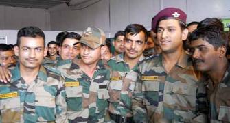 PHOTOS: Lt. Col Dhoni meets Indian army troops in J&K