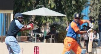 Sehwag back among runs as T20 match ends in tie