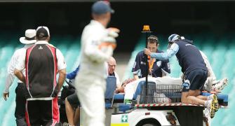 Cricket world in shock over Phil Hughes' injury