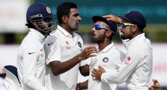 Bowlers keep Lanka in check after Saha swells India's total