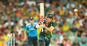 Warner blazes as Australia ease past England in tri-series opener