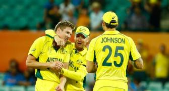 Australia knock defending champs India out of World Cup